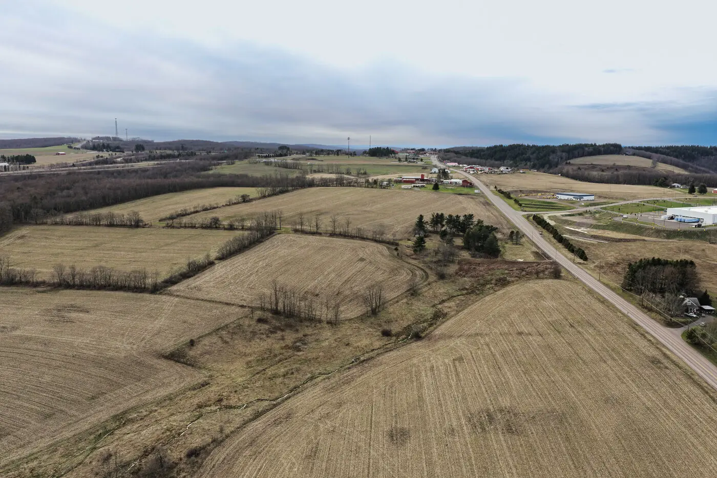 Aerial view of cultivated fields and acreage on a Virginia land parcel