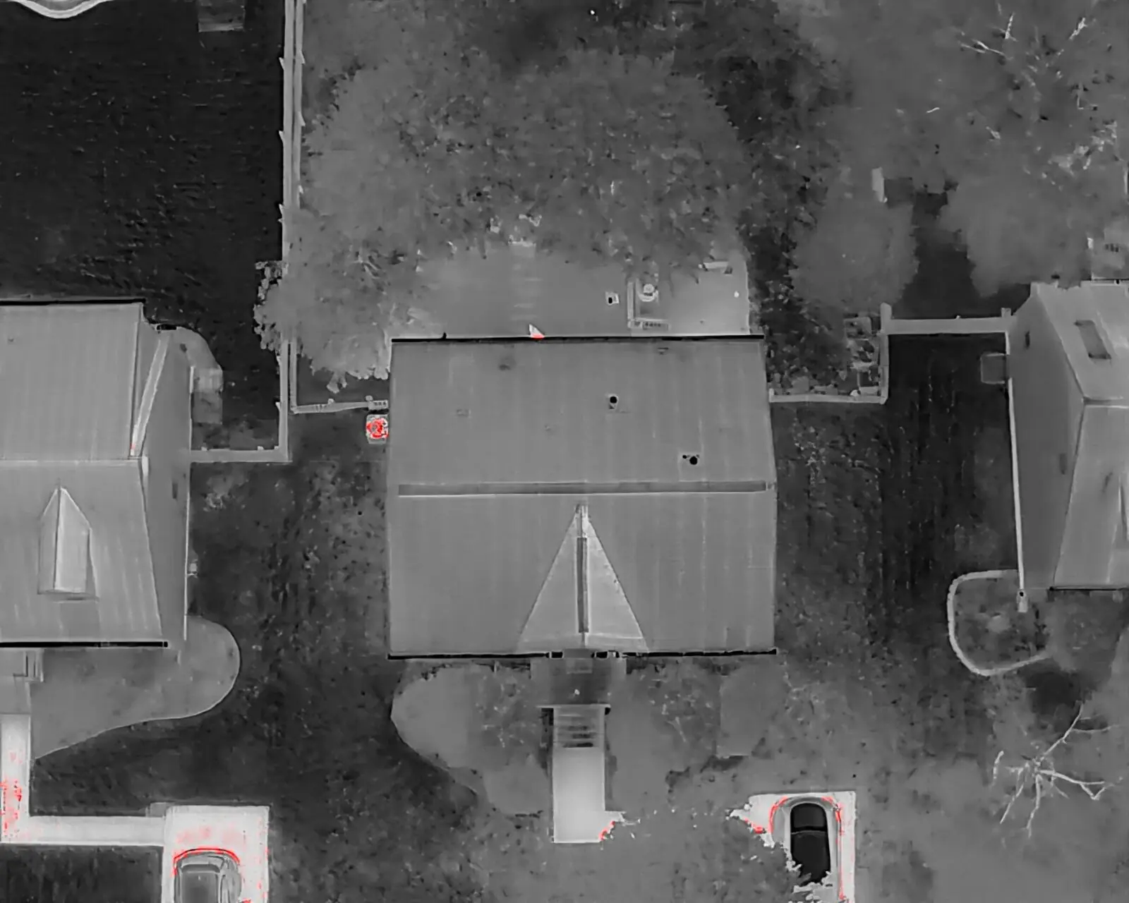 White-hot thermal drone scan of the same rooftops